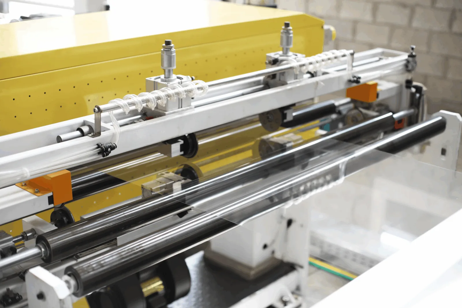 Close-up of the sheet guide rails during production